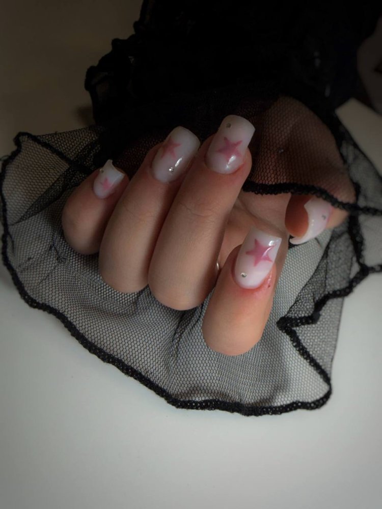 Manicure with pink stars design by Alina Nails Calgary